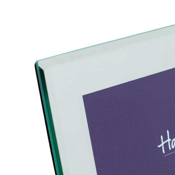 Close-up of green book spine and purple cover